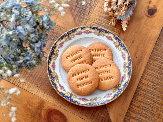 UN BISCUIT CONTRE UN BISOU